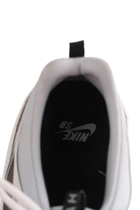 Baskets basses Nike Gris en Tissu