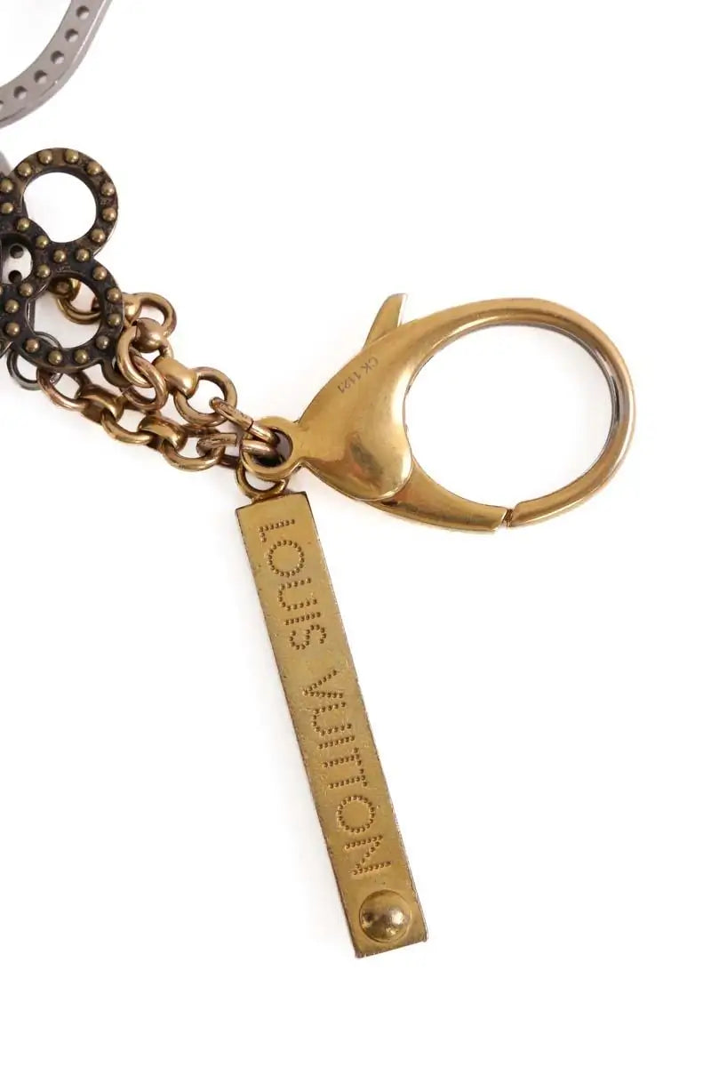 Porte-clé Louis Vuitton Doré en Autres