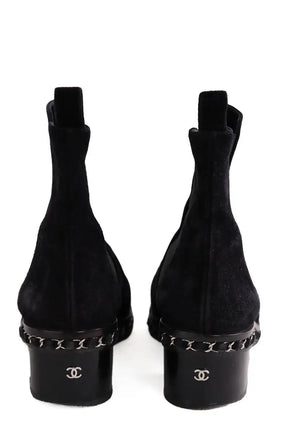 Boots à boucles Chanel Noir en Daim