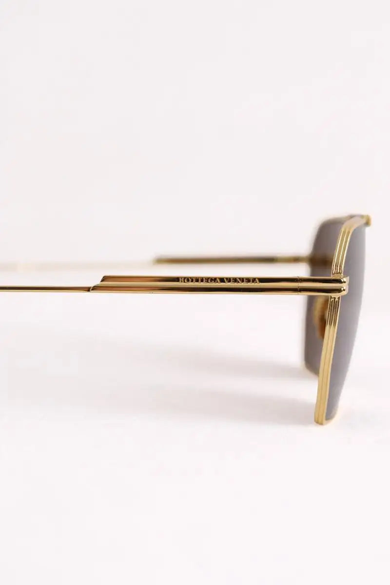 Lunettes de soleil Bottega Veneta Doré en Métal