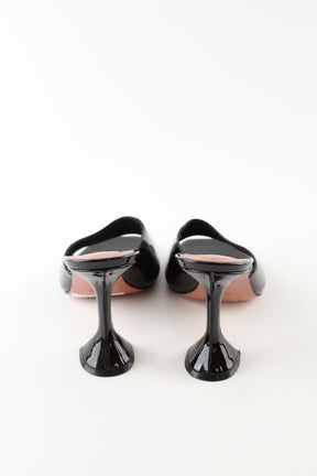 Mules Amina Muaddi  Noir