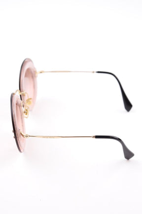 Lunettes de soleil Miu Miu  Rose