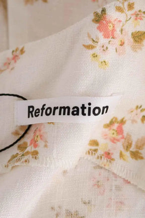 Robe Reformation Beige en Lin