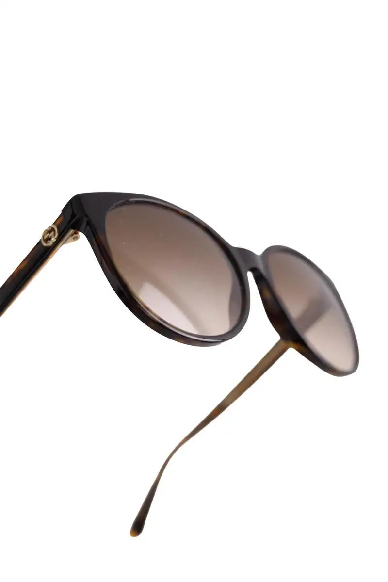 Lunettes de soleil Gucci Marron en Plastique