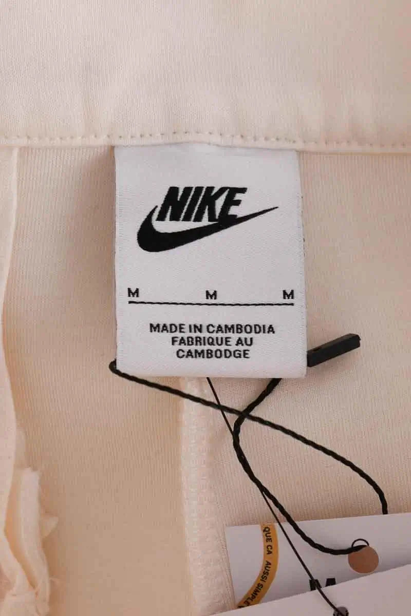 Pantalon Carot Nike Ecru en Synthétique
