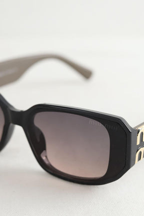 Lunettes de soleil Miu Miu  Noir