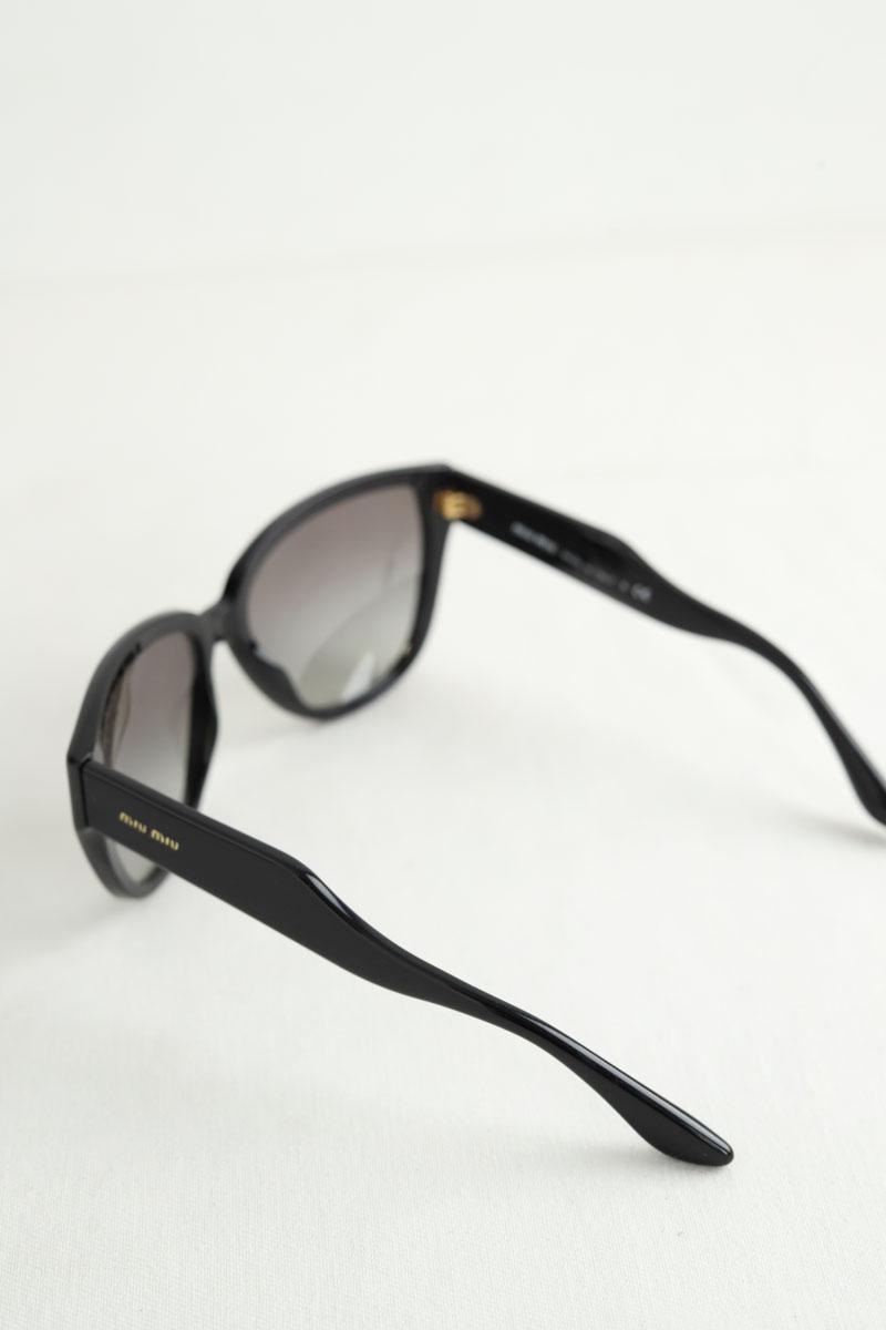 Lunettes de soleil Miu Miu  Noir