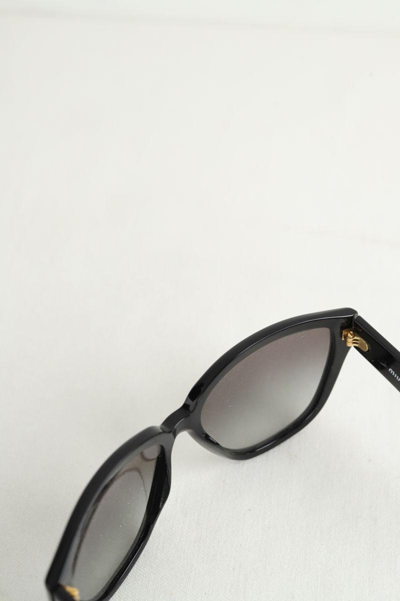 Lunettes de soleil Miu Miu  Noir