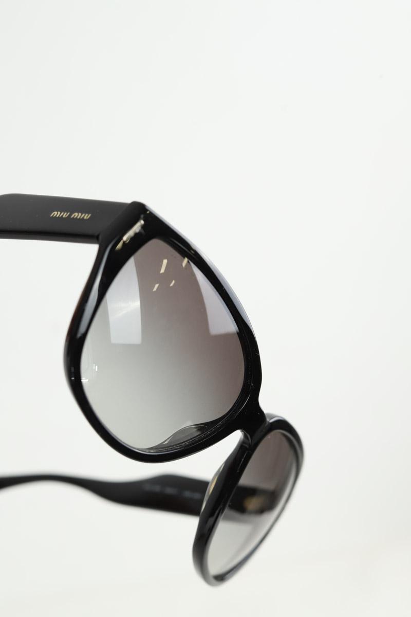 Lunettes de soleil Miu Miu  Noir