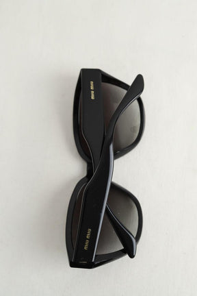 Lunettes de soleil Miu Miu  Noir