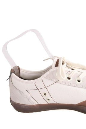 Baskets basses Lacoste Beige en Tissu