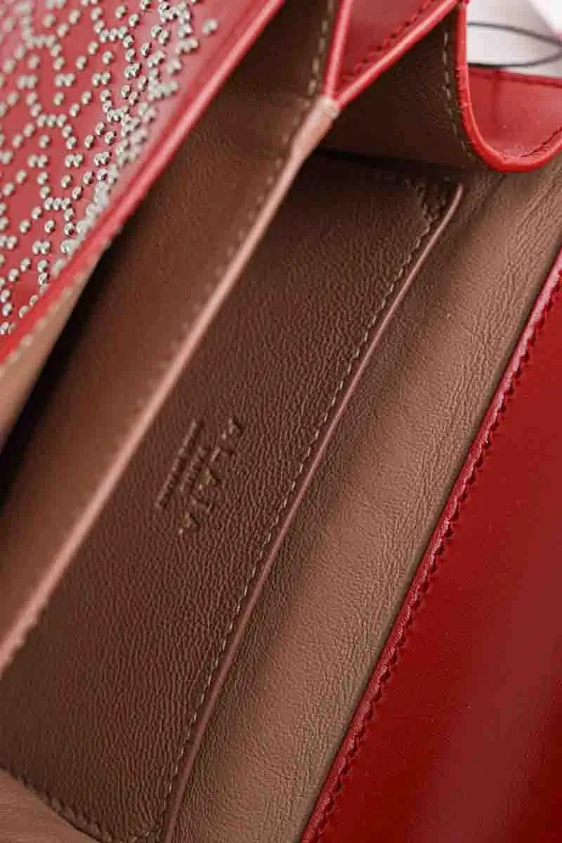 Sac à bandoulière Alaïa Arabesque Rouge en Cuir