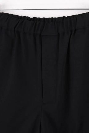 Pantalon Carot Comme Des Garçons Noir en Laine
