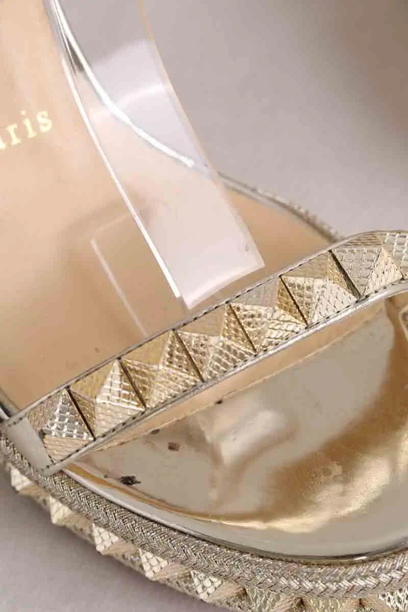 Talons Christian Louboutin Doré en Cuir