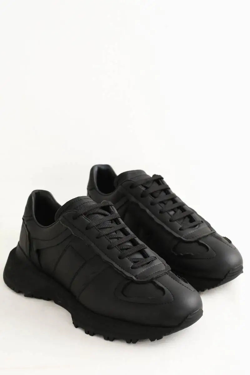 Baskets basses Maison Martin Margiela Noir en Cuir