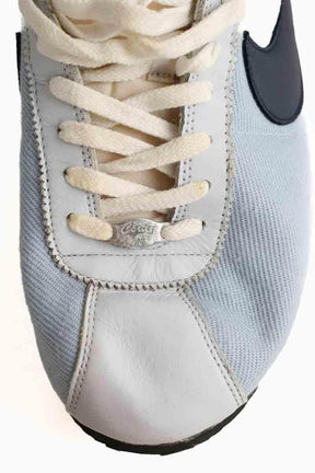 Baskets basses Nike Bleu en Daim