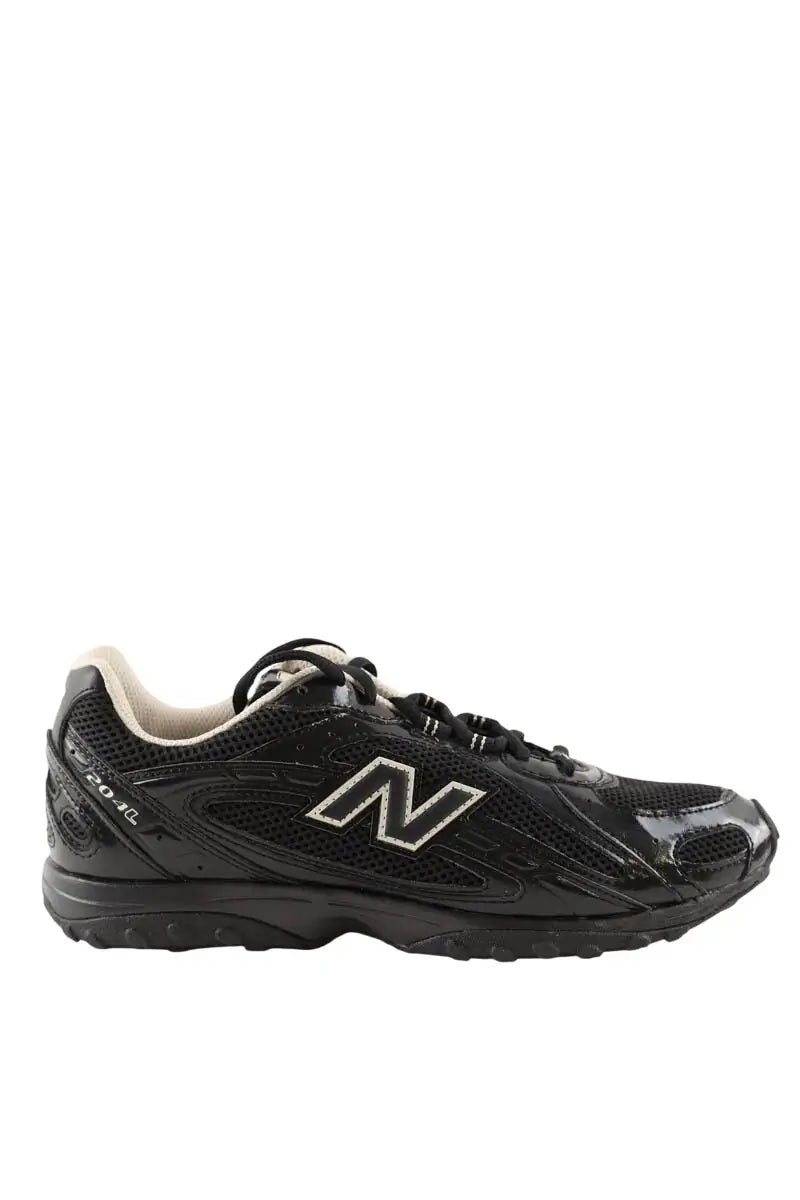 Baskets New Balance 204L Noir en Cuir, taille 39 - Seconde Main