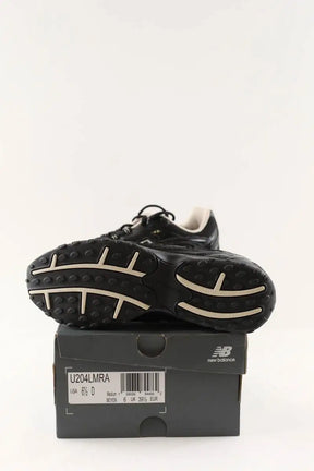 Baskets New Balance 204L Noir en Cuir