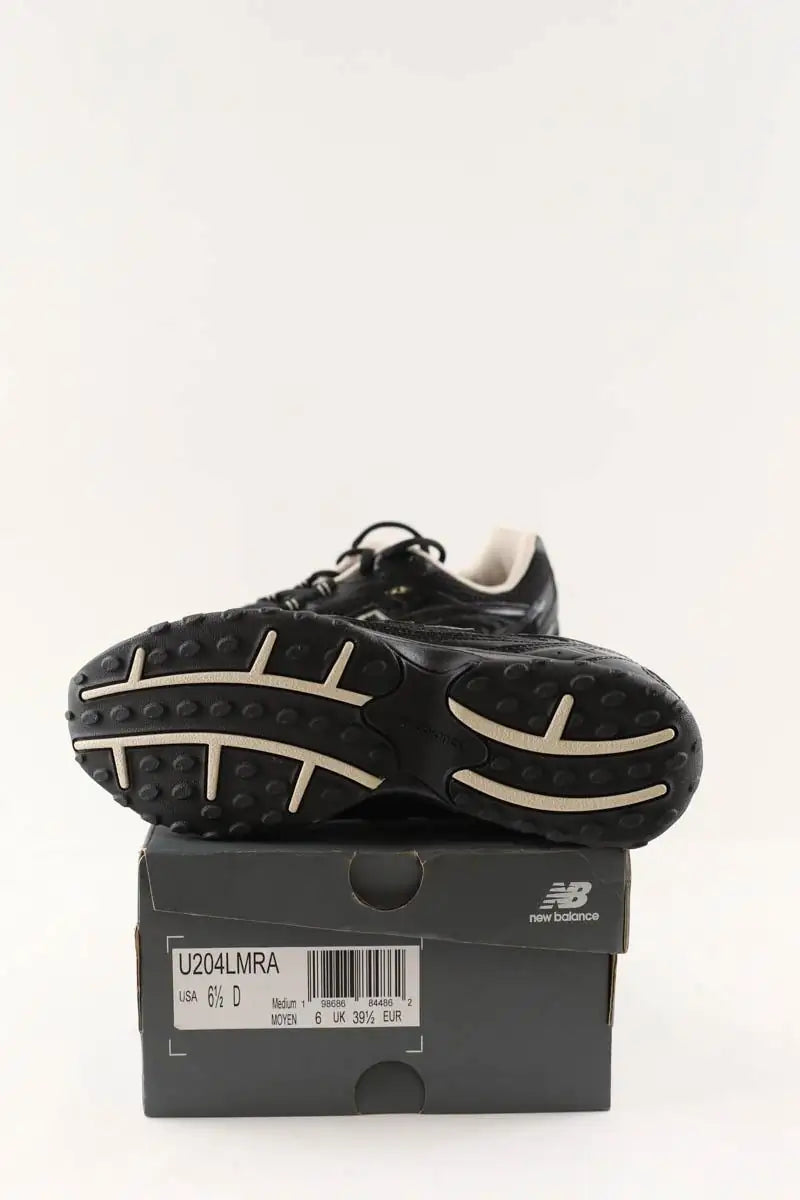 Baskets New Balance 204L Noir en Cuir