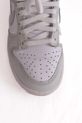 Baskets Nike Gris en Cuir