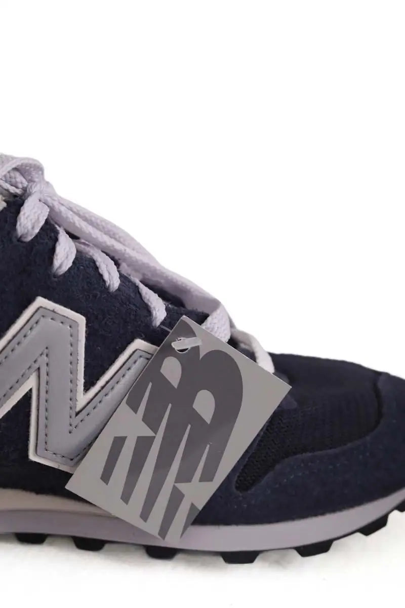 Baskets basses New Balance Marine en Tissu