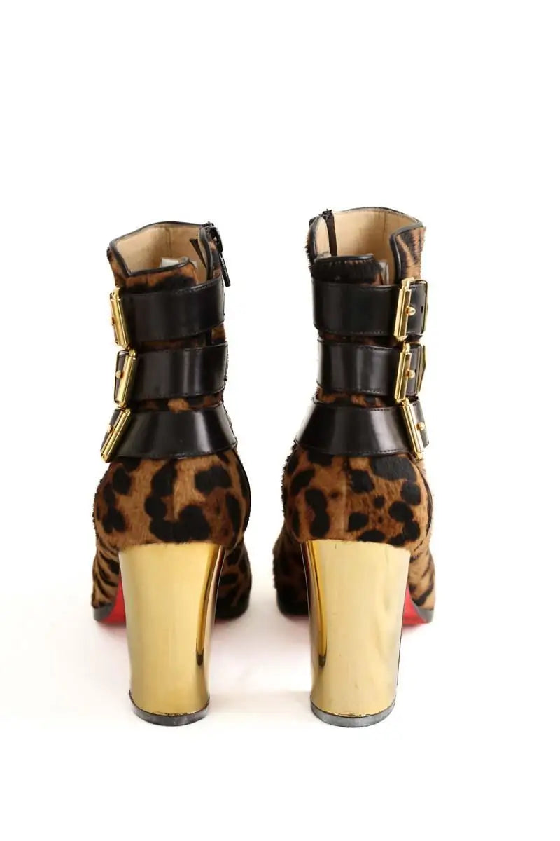 Boots à boucles Christian Louboutin Marron en Cuir