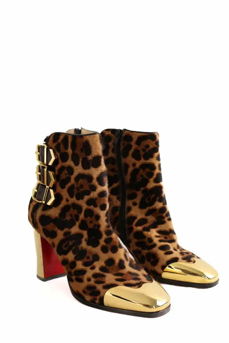 Boots à boucles Christian Louboutin Marron en Cuir