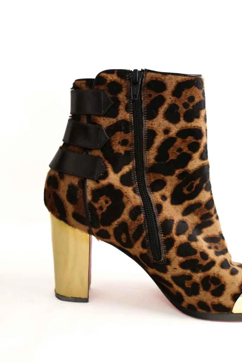 Boots à boucles Christian Louboutin Marron en Cuir