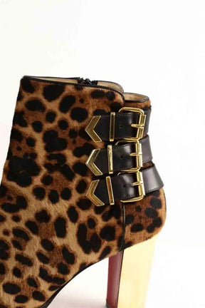 Boots à boucles Christian Louboutin Marron en Cuir