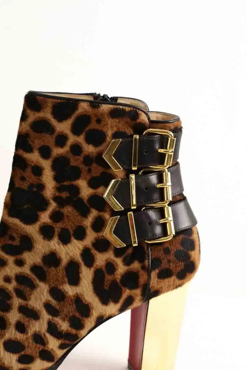 Boots à boucles Christian Louboutin Marron en Cuir