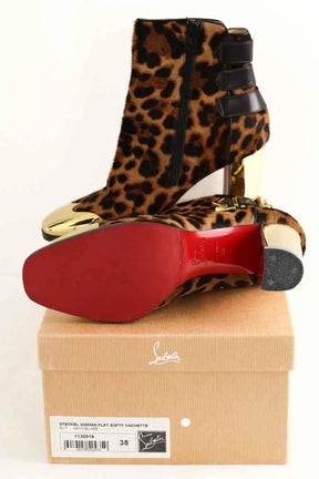 Boots à boucles Christian Louboutin Marron en Cuir