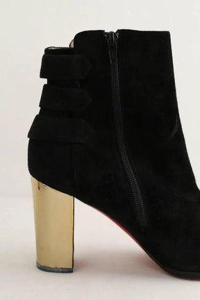 Boots à boucles Christian Louboutin Noir en Daim