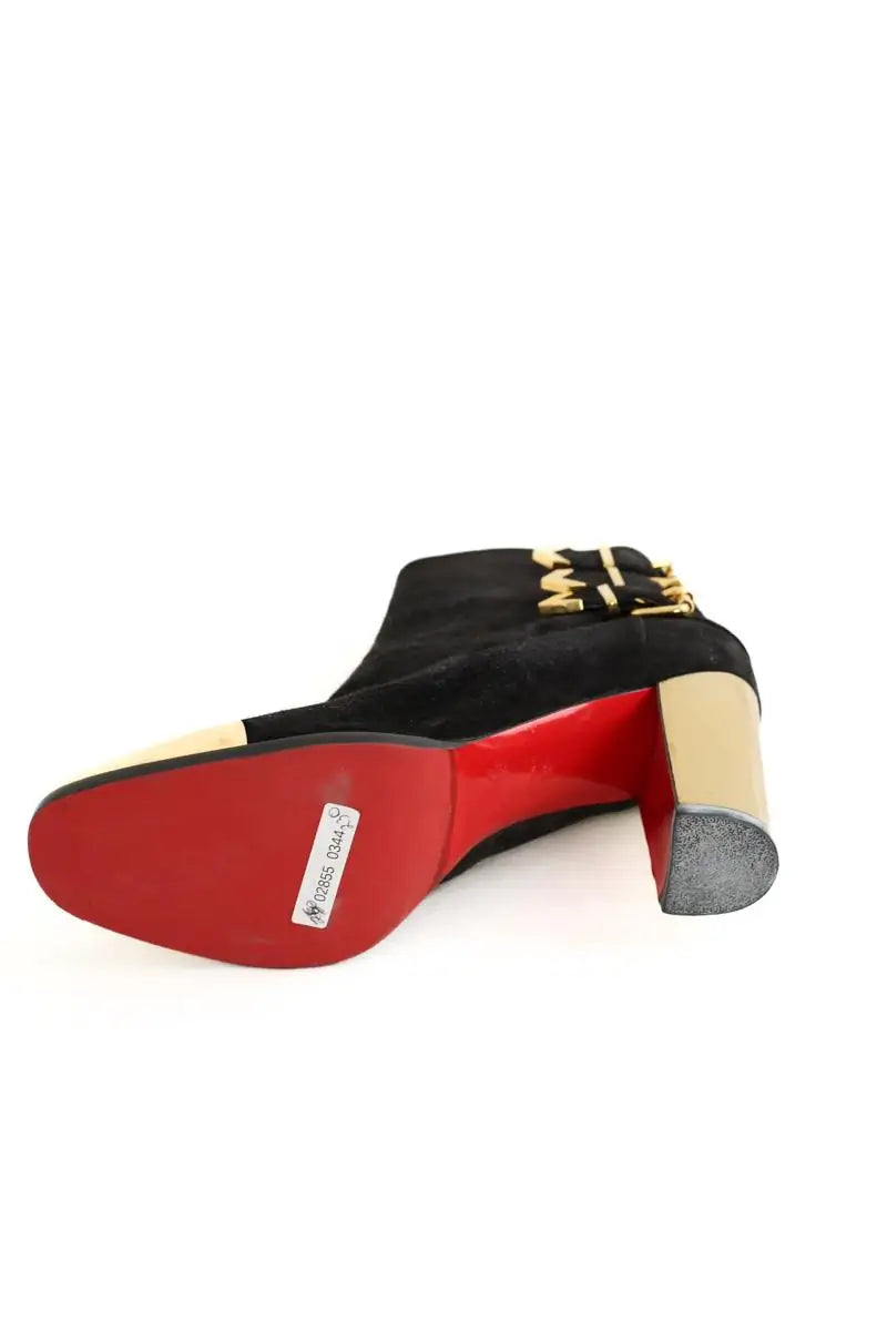 Boots à boucles Christian Louboutin Noir en Daim