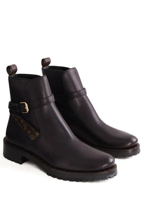 Boots à boucles Louis Vuitton Discovery Flat Noir en Cuir