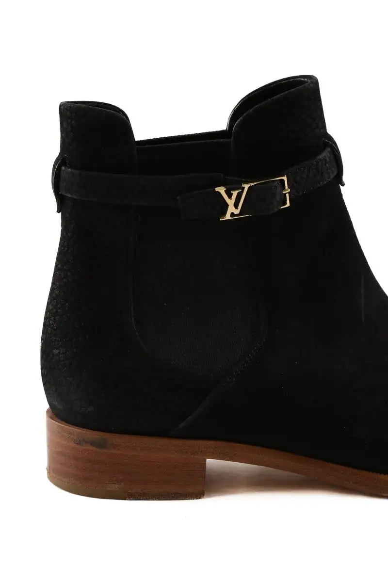 Boots à boucles Louis Vuitton Noir en Cuir