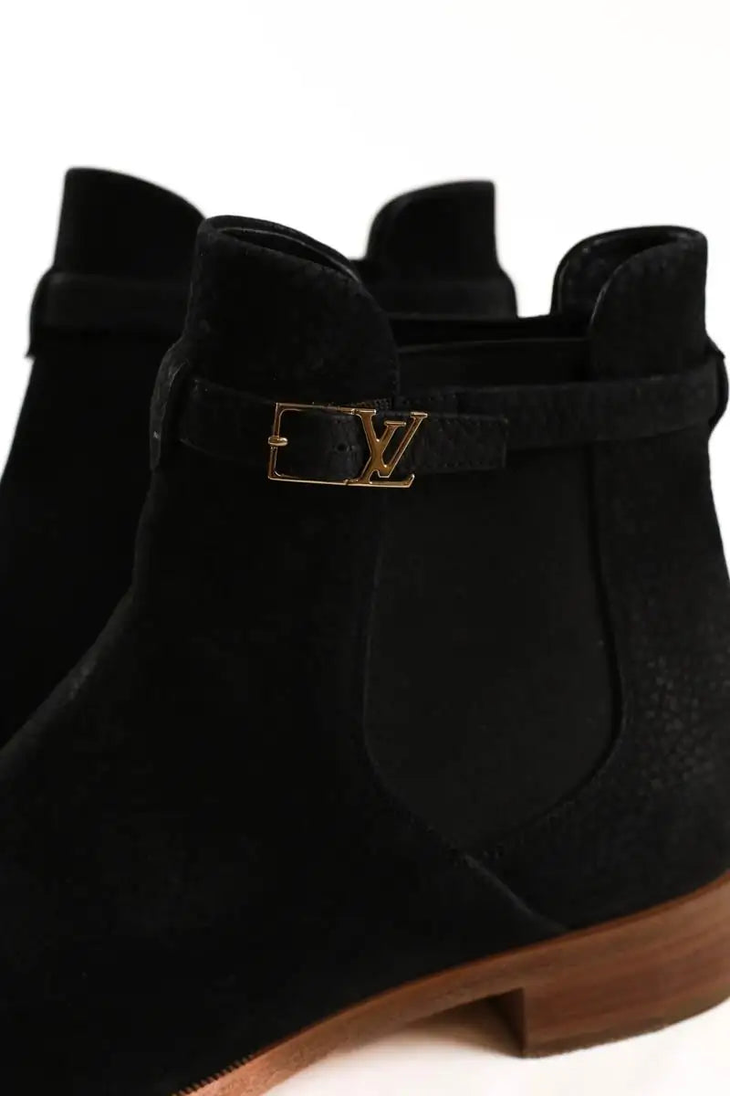 Boots à boucles Louis Vuitton Noir en Cuir