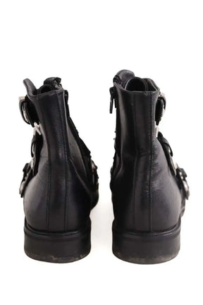 Boots à boucles Maje Noir en Cuir