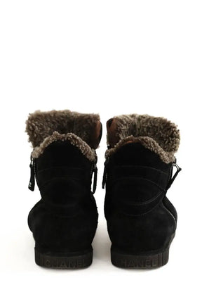 Boots fourées Chanel Noir en Daim