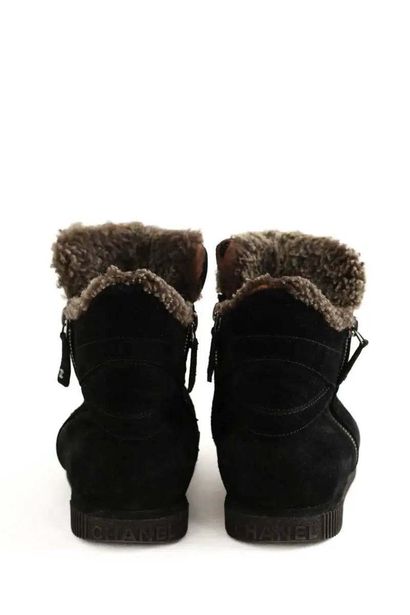 Boots fourées Chanel Noir en Daim