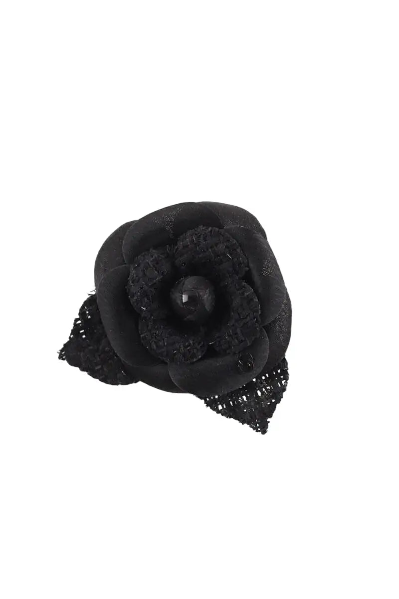 Broche  Chanel Camélia en tweed Noir en Tissu - Seconde Main