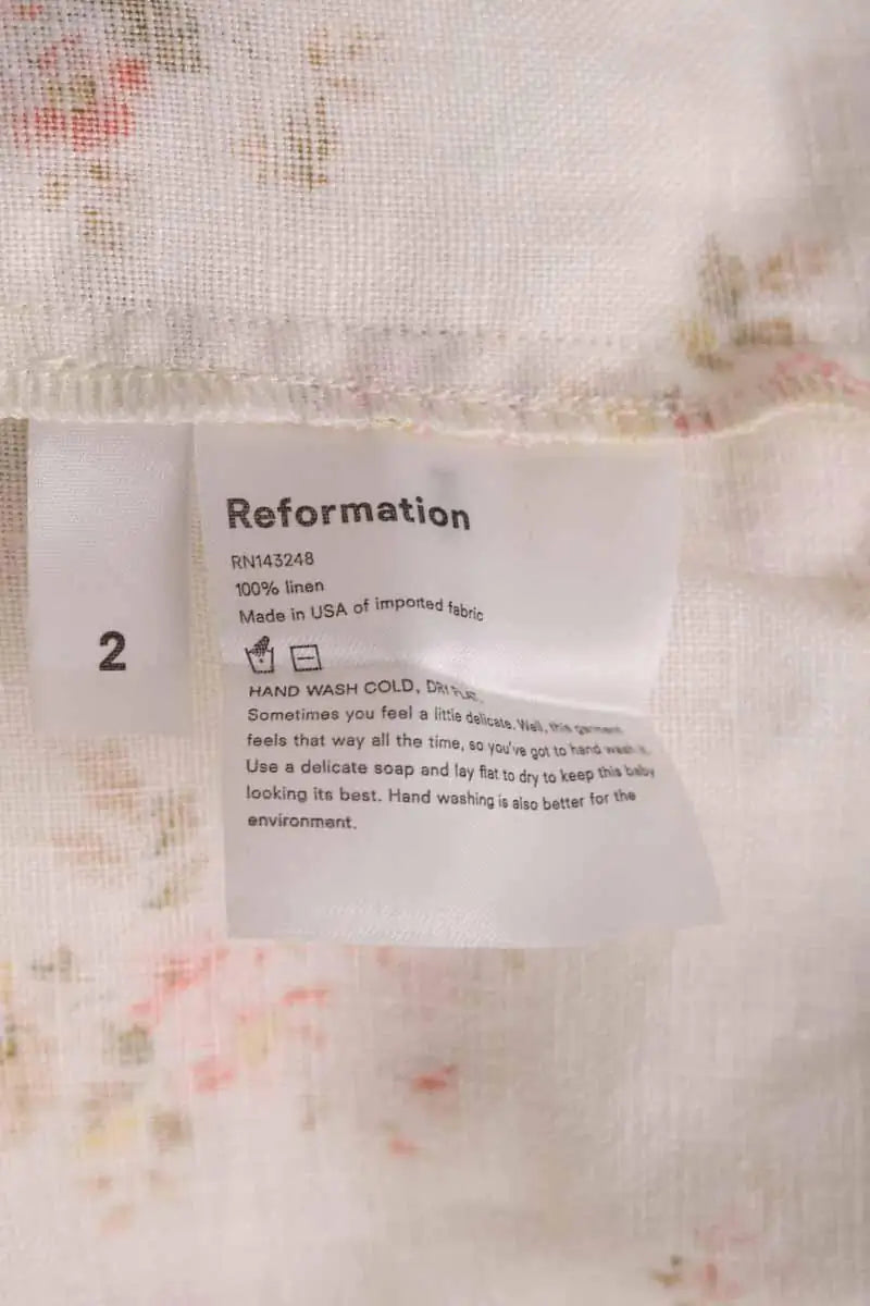 Robe Reformation Beige en Lin