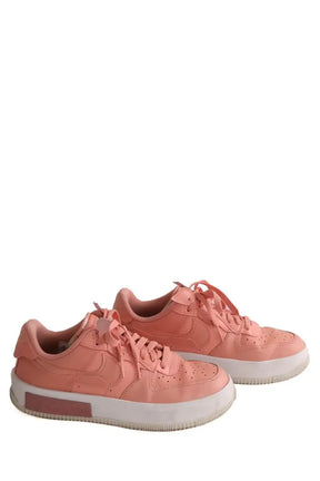 Baskets Nike Rose en Cuir