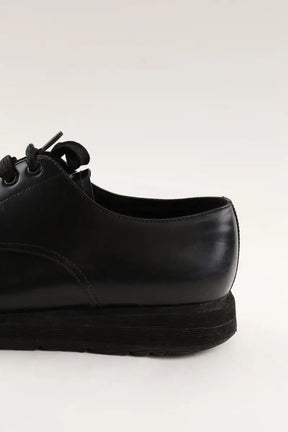 Chaussures à lacets Prada Noir en Cuir