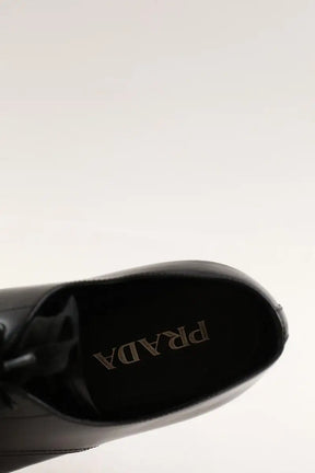 Chaussures à lacets Prada Noir en Cuir