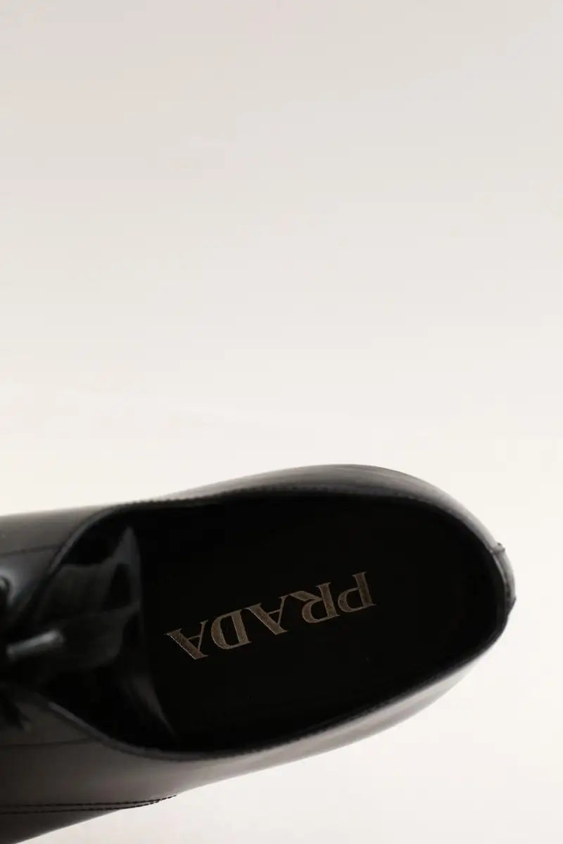 Chaussures à lacets Prada Noir en Cuir