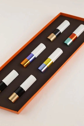 Coffret rouge à lèvres avec livre  Hermès La beauté hermès Orange en 