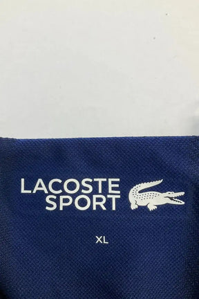 Polo Lacoste Bleu en Synthétique