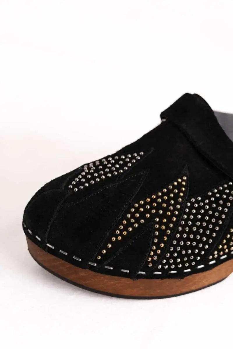 Sabots Saint Laurent Studded accents slides Noir en Daim
