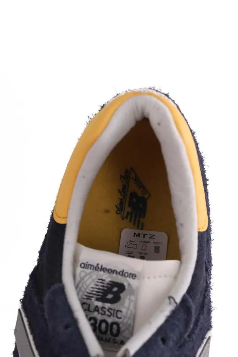 Baskets basses New Balance Marine en Tissu