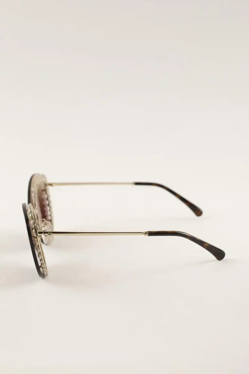 Lunettes de protection Chanel Doré en Plastique